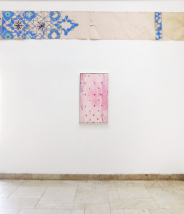 Blue patterned horizontally hung wallpaper panels over pink dotted picture. Anna Slobodnik 2015. 