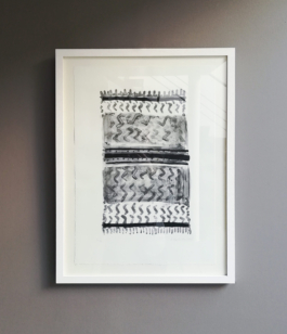 A framed lithograph of a carpet in black and white. Anna Slobodnik, 2018. 