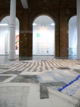 Close up of checkered drawing on canvas. 