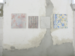 Four paintings, from left to right: one blueish one with pink patterns on it, one brownish with dots and flower tendrils, one with pencil drawn Houndstooth, the last one with a tile-like pattern of blue and yellow. Anna Slobodnik 2015. 