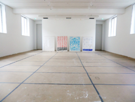 Big room with four large paintings on the back wall. One white, one red, one blue and one with tiles. Anna Slobodnik 2016. 