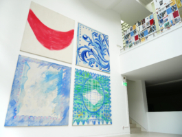 View of four high scale canvas paintings of forms, patterns and ornaments. 