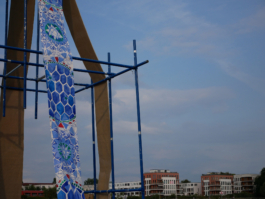 A detail of a blue ornament on a painting on a raft. 
