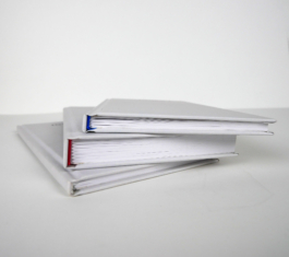 Three books on top of each other.