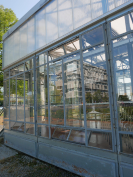 A painting of a glass behind glass. 