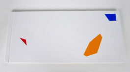 A white book with red, yellow and blue forms on it.