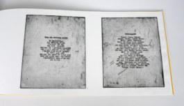 A page with two etchings of poems on it.