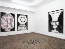 Three oilpaintings with vases on them, two next to each other one around the corner. 