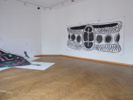 A painting of a bracelet in black and a painting of a scarf in black, purple and turquoise. 